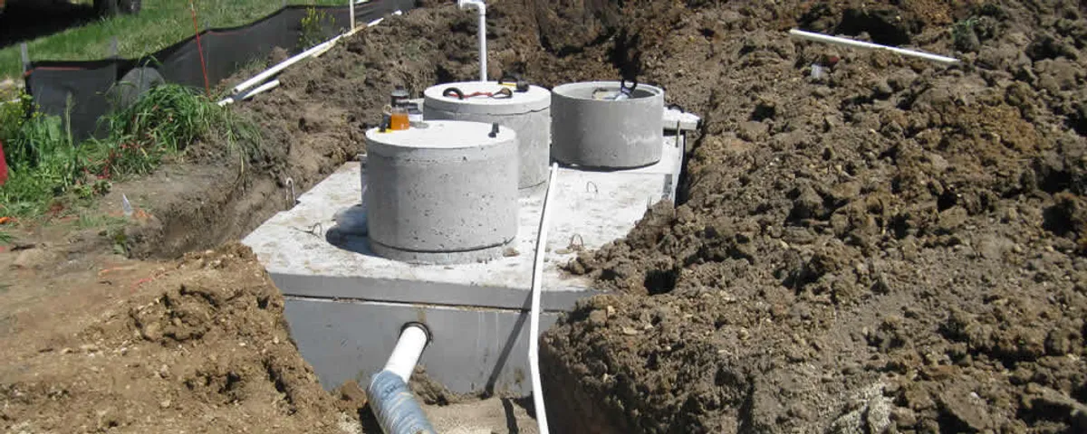Septic system repair and installation site with tank access ports in Chattanooga, TN