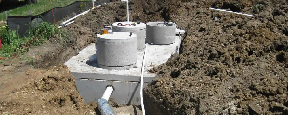 Septic system repair and installation site with tank access ports in Chattanooga, TN