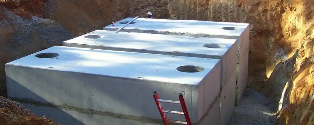 Septic tank installation site with a newly placed concrete tank in Chattanooga, TN